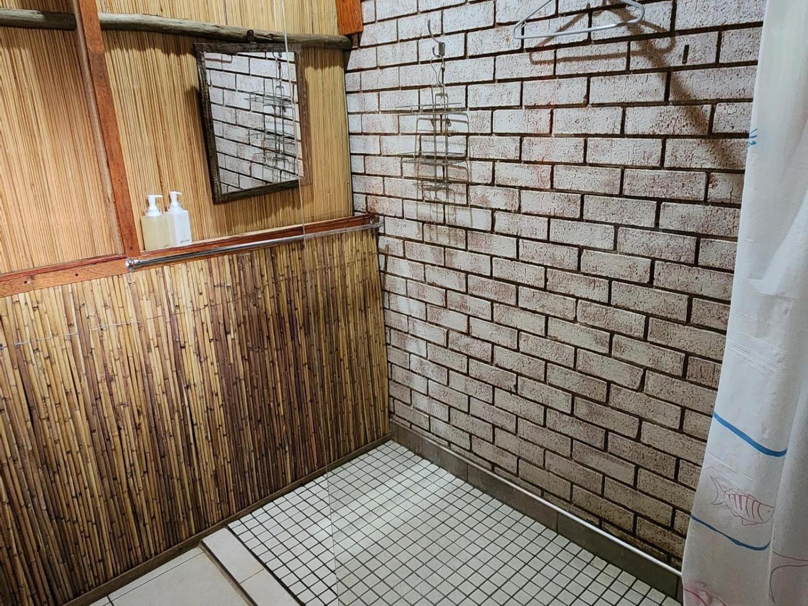 Nxabii Cottages 카사네 객실 사진